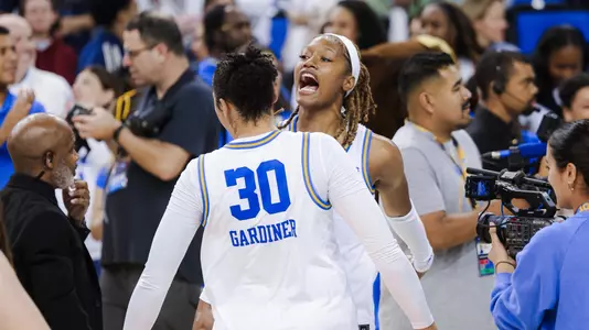 Janiah Barker celebrating with Timea Gardiner_UCLA vs. South Carolina (Nov. 24, 2024)