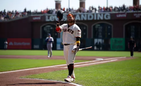 Oct 1, 2023; San Francisco, California, USA; San Francisco Giants shortstop Brandon Crawford (35) acknowledges the cheers of the crowd as he comes to bat against the Los Angeles Dodgers during the first inning at Oracle Park, in what could be his final game with the team. Mandatory Credit: D. Ross Cameron-USA TODAY Sports