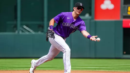 Jul 30, 2023; Denver, Colorado, USA; Colorado Rockies first baseman Michael Toglia (4) fields the ball in the first inning against the Oakland Athletics at Coors Field. Mandatory Credit: Ron Chenoy-USA TODAY Sports