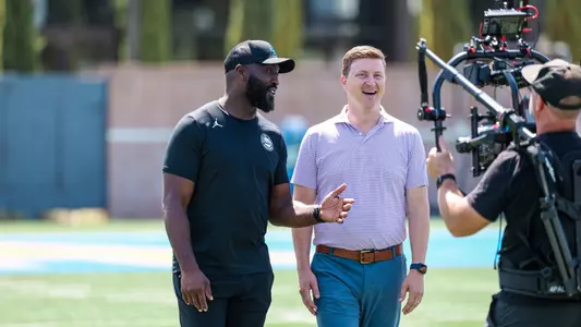 UCLA Football Head Coach DeShaun Foster with BTN's Mike Hall