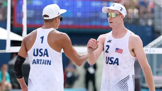 PARIS, FRANCE - AUGUST 01: Andrew Benesh of Team United States celebrates with teammate Miles Partain during the Men's Preliminary Phase - Pool A match between Team United States and Team Brazil on day six of the Olympic Games Paris 2024 at on August 01, 2024 in Paris, France. (Photo by Lintao Zhang/Getty Images)