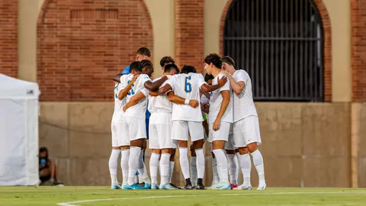 Men's Soccer Team Huddle