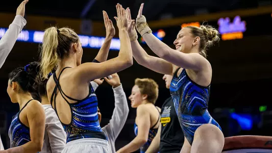 Ashlee Sullivan high-fives Bronwyn Hoffman