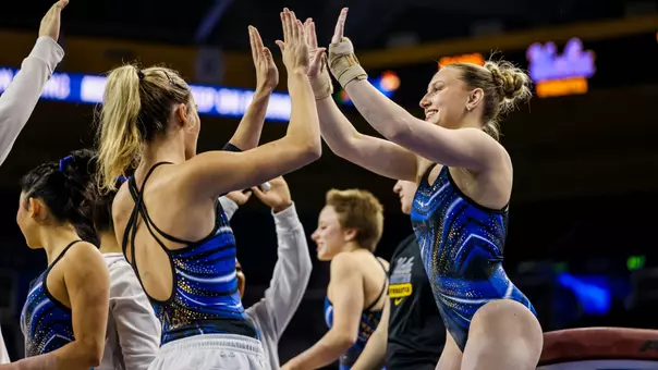 Ashlee Sullivan high-fives Bronwyn Hoffman