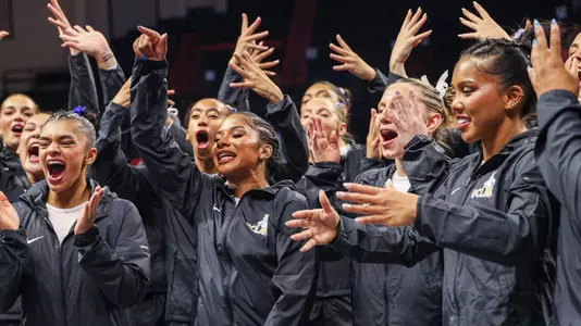 UCLA celebrates after placing first in the NCAA Corvallis Regional second round
