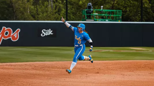 Megan Grant rounds the bases after her NCAA-record 38th home run