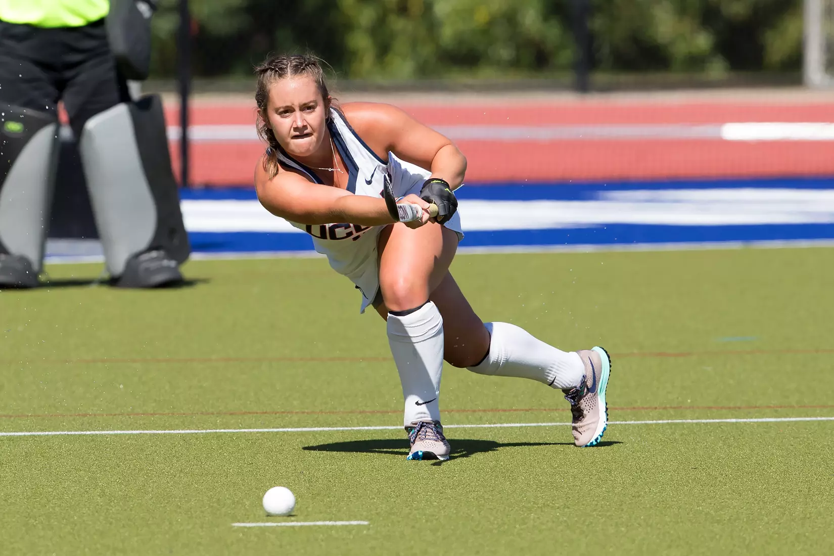 Kourtney Kennedy passes the ball.
