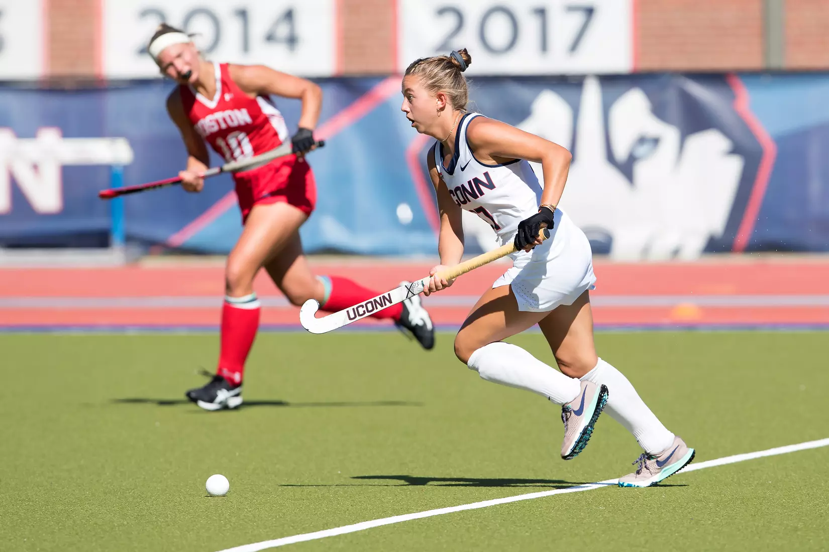 Olivia Clarke runs with the ball vs. BU.