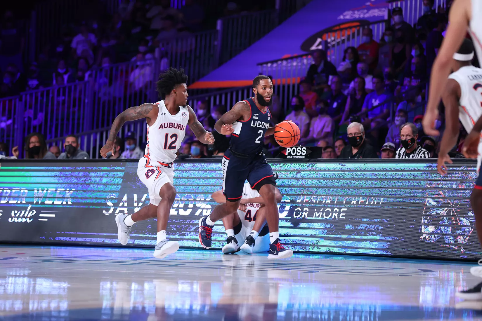 Connecticut Huskies guard R.J. Cole (2) and Auburn Tigers guard Zep Jasper (12) at the Battle 4 Atlantis Wednesday, November 24, 2021 at Atlantis, Paradise Island in the Bahamas. (Photo by Tim Aylen)