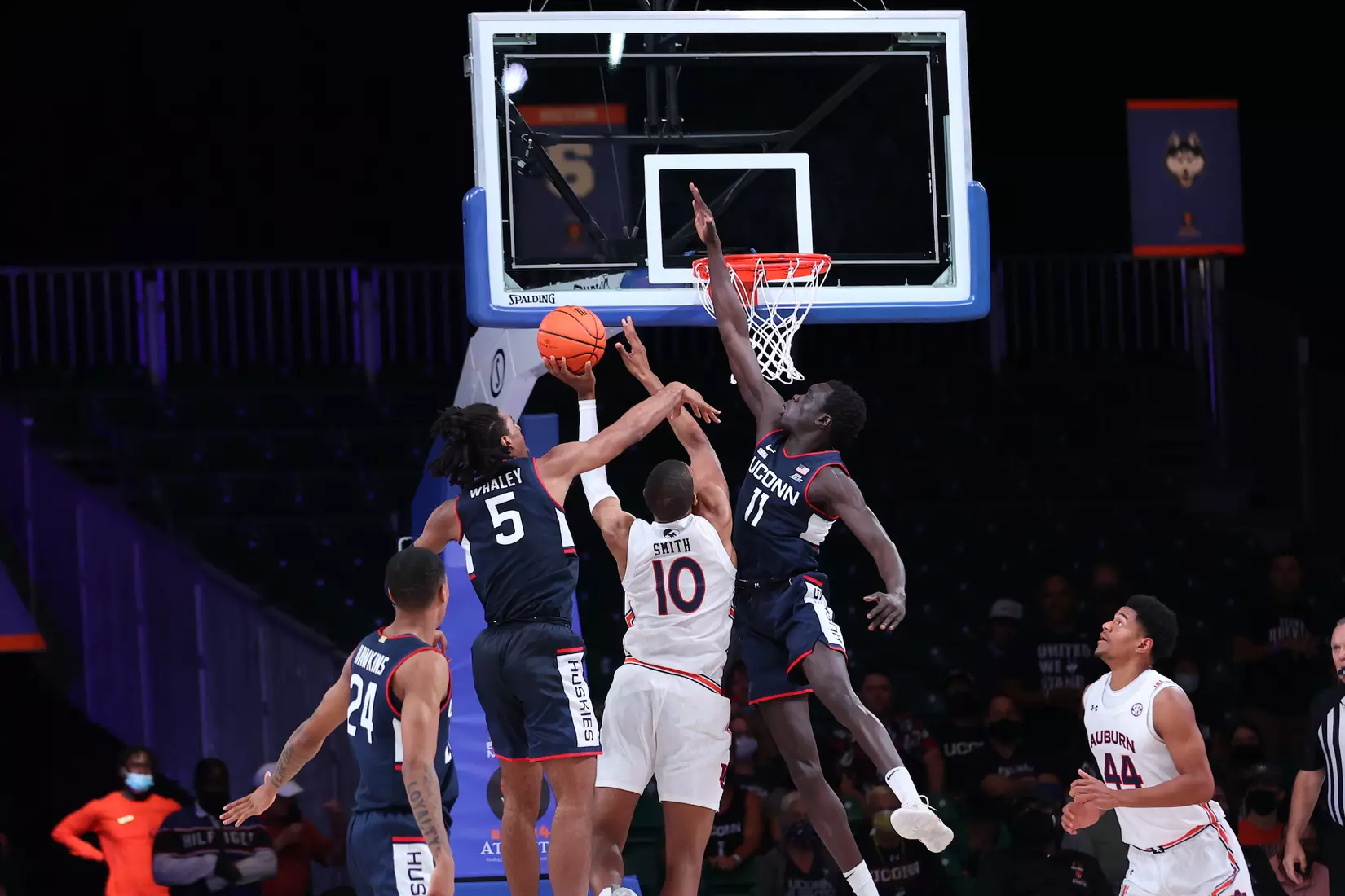 Auburn Tigers forward Jabari Smith (10), Connecticut Huskies forward Isaiah Whaley (5) and Connecticut Huskies forward Akok Akok (11) at the Battle 4 Atlantis Wednesday, November 24, 2021 at Atlantis, Paradise Island in the Bahamas. (Photo by Tim Aylen)
