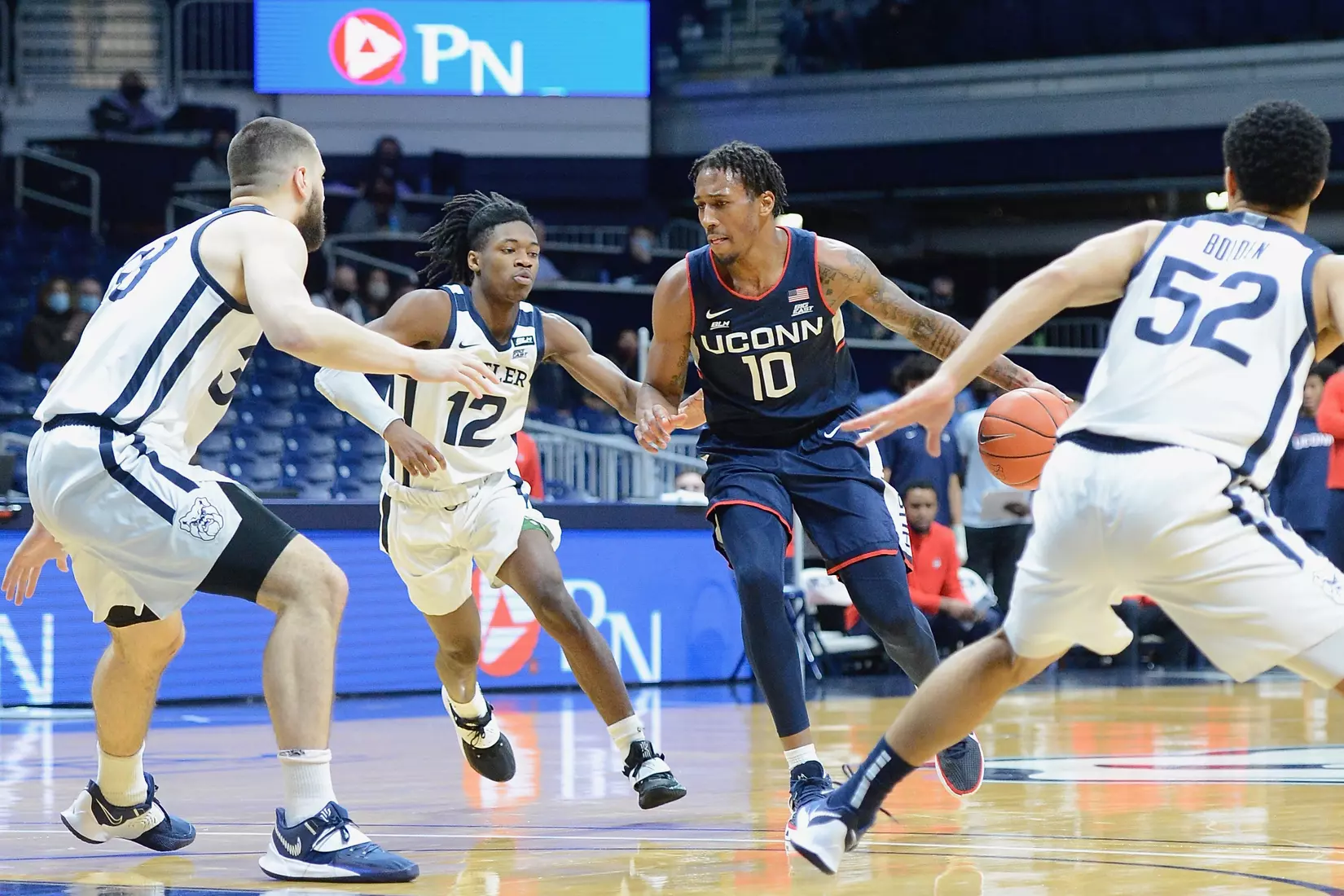 Brendan Adams dribbles against Butler on January 9, 2021.