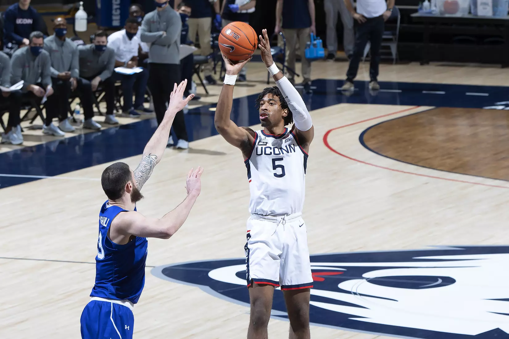 Isaiah Whaley shoots a three-pointer against Seton Hall on February 6, 2021.
