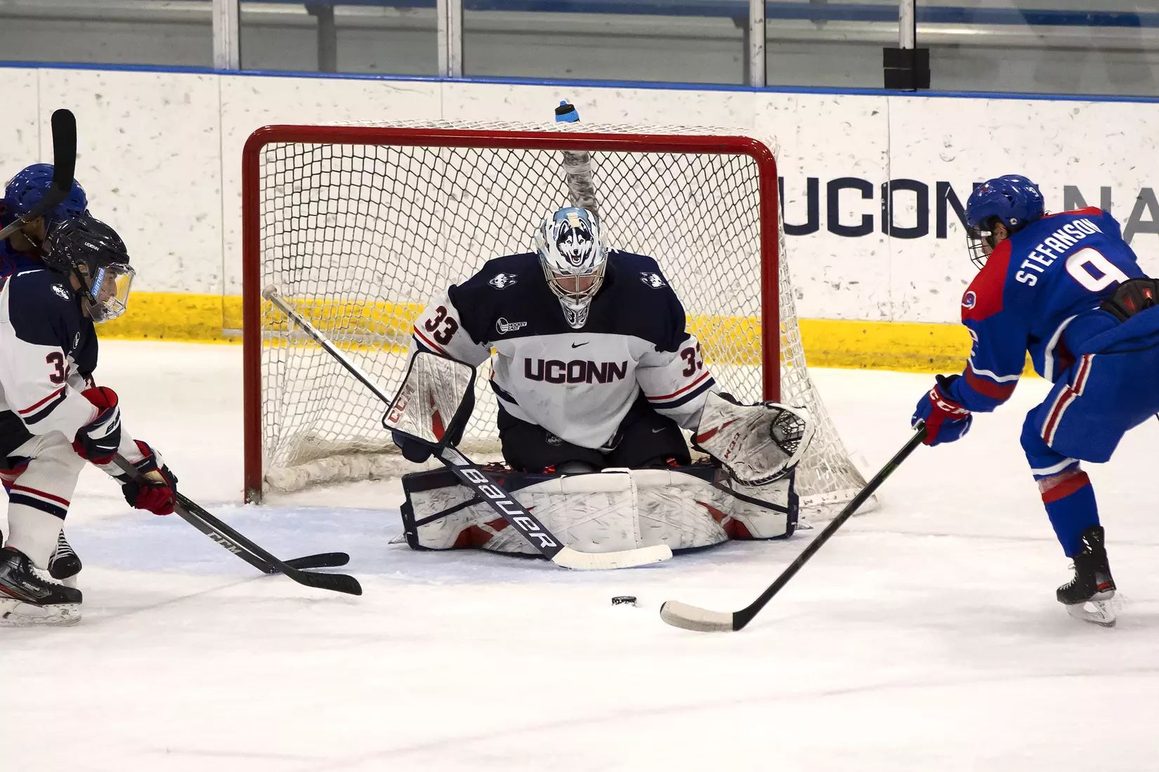 Tomas Vomacka makes a save against UMass Lowell on December 21, 2020.