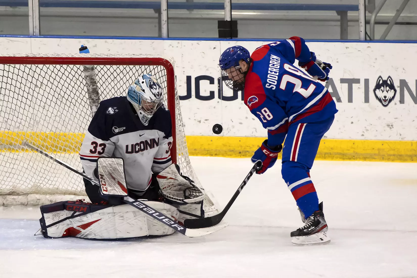 Tomas Vomacka makes a stop against UMass Lowell on December 21, 2020.