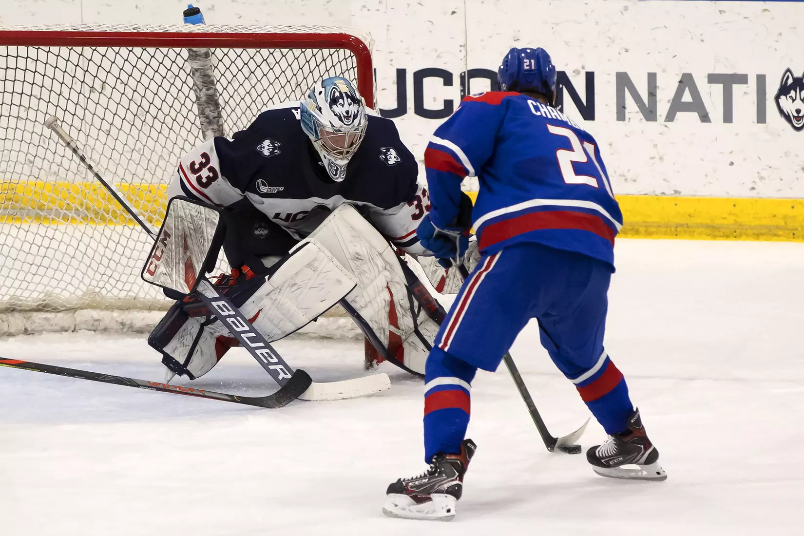 Tomas Vomacka makes a save against UMass Lowell on December 21, 2020.