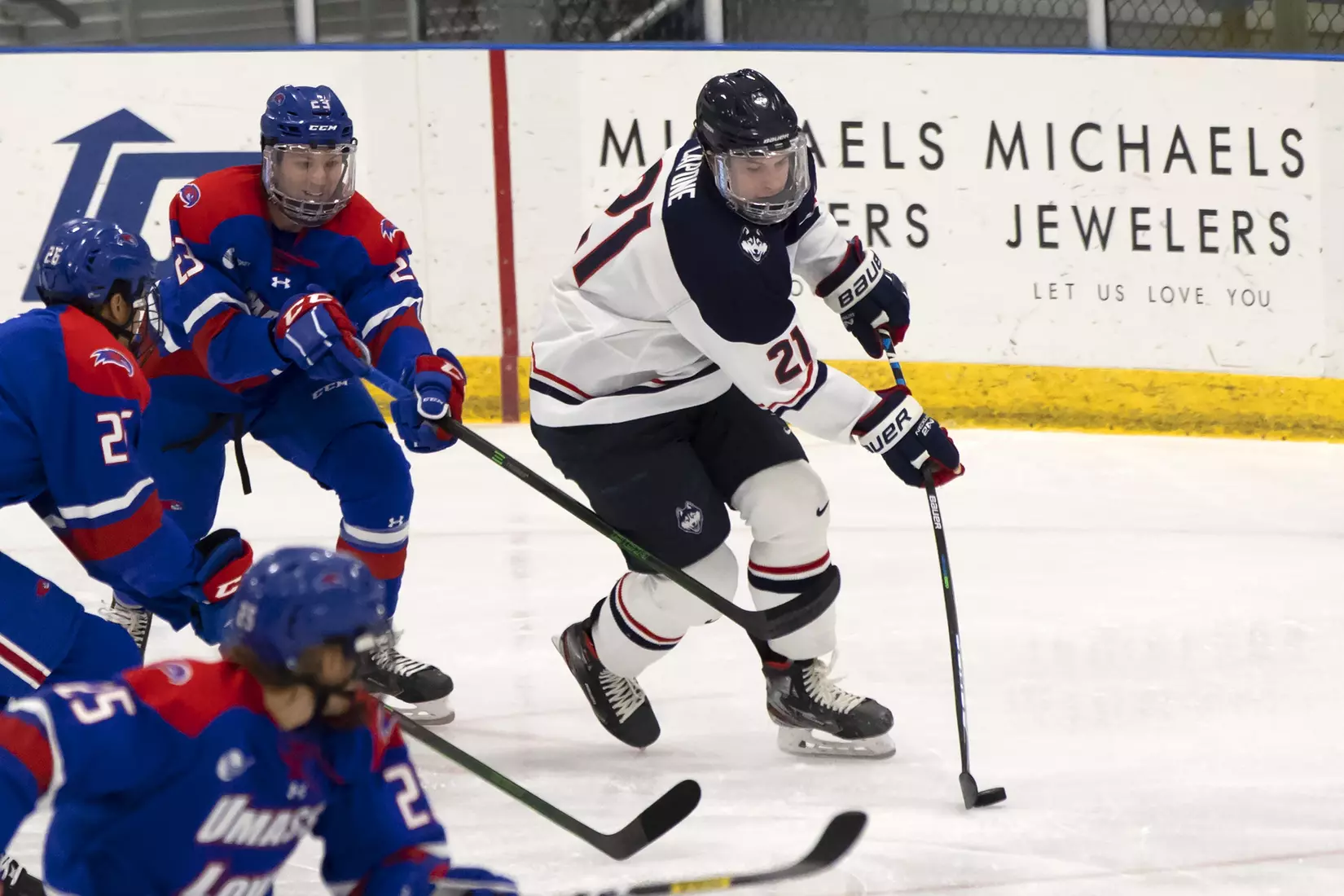 Nick Capone controls the puck against UMass Lowell on December 21, 2020.