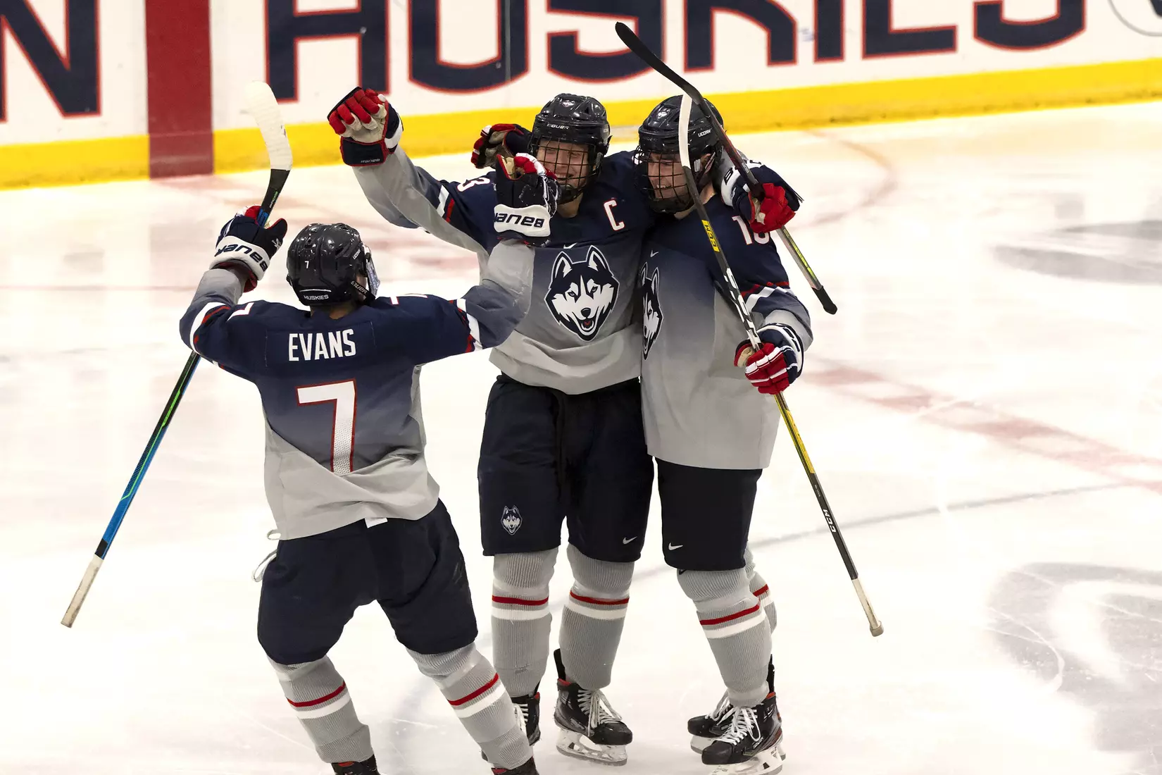 The Huskies celebrate Adam Karashik's goal against Providence on December 28, 2020.