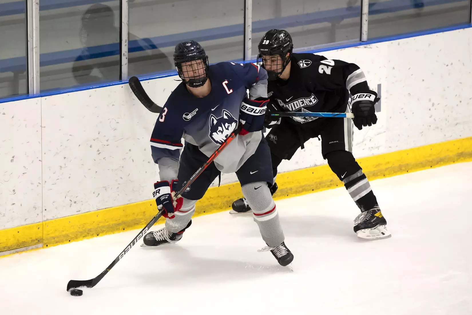 Adam Karashik looks to pass in game vs Providence on December 28, 2020.