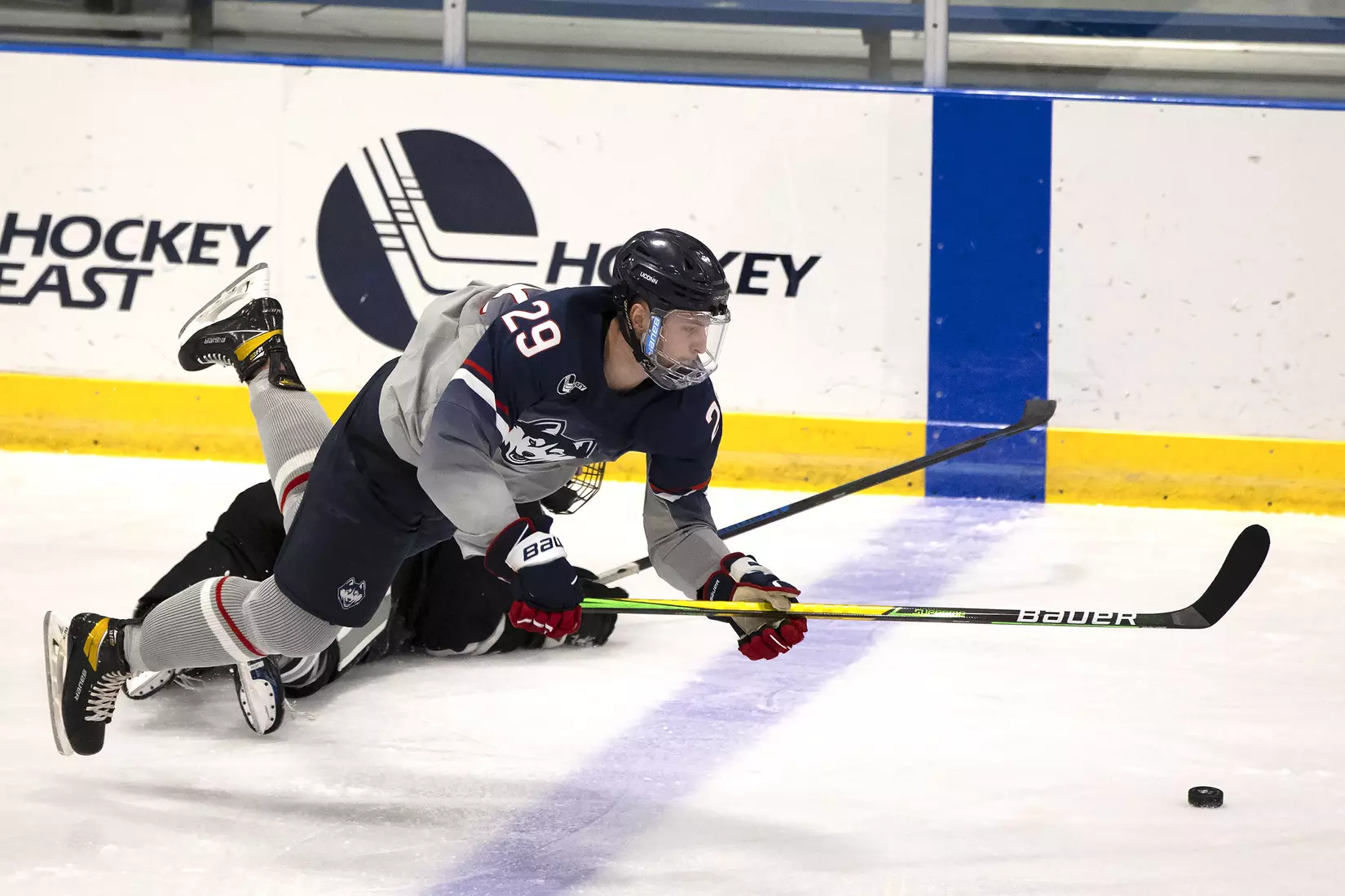 Kale Howarth fights for possession against Providence on December 28, 2020.