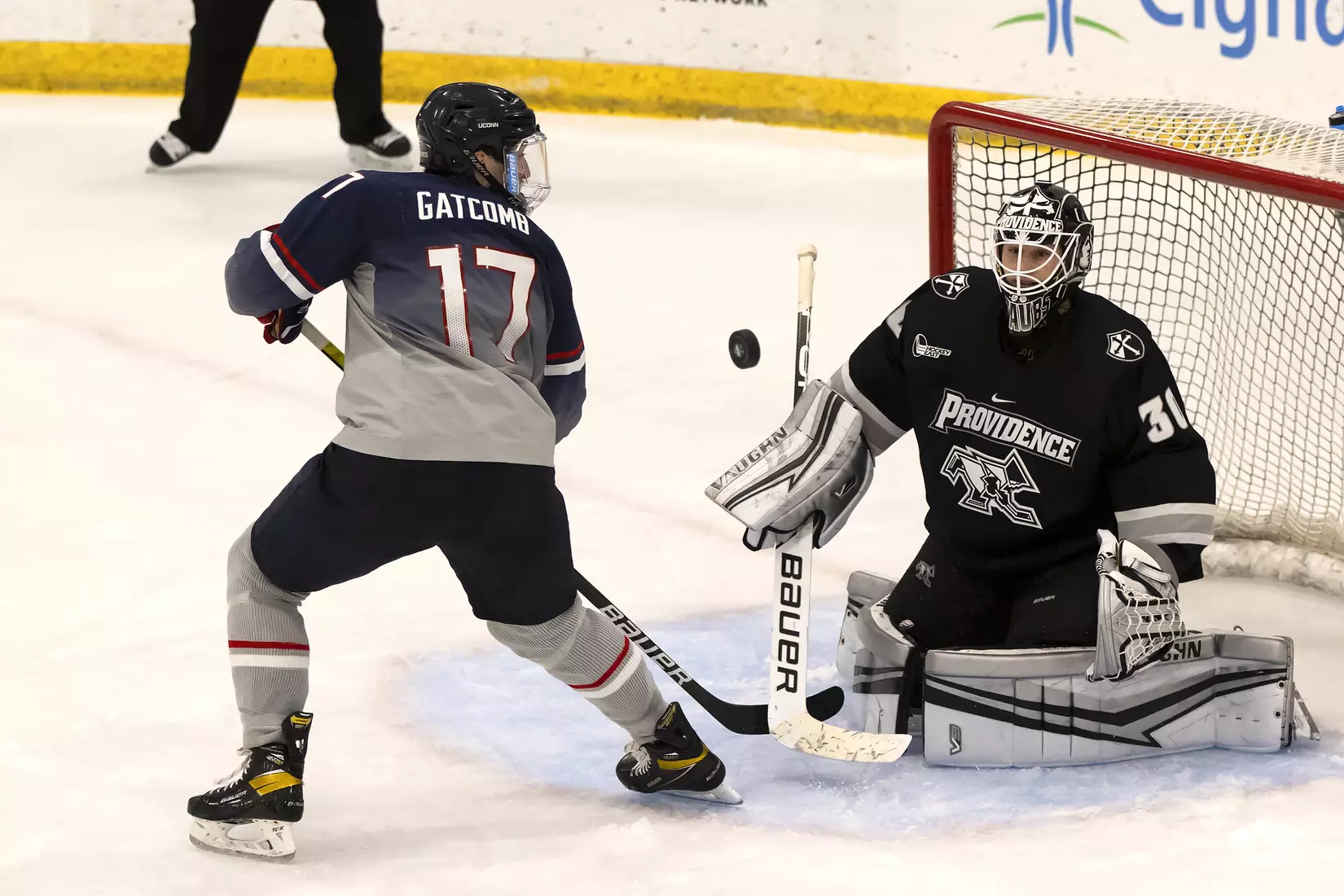 Marc Gatcomb gets a shot off vs Providence on December 28, 2020.