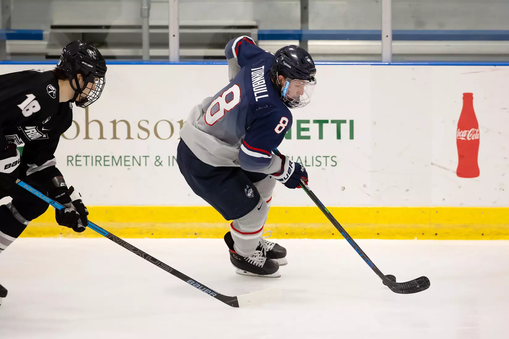Carter Turnbull controls the puck against Providence on December 28, 2020.