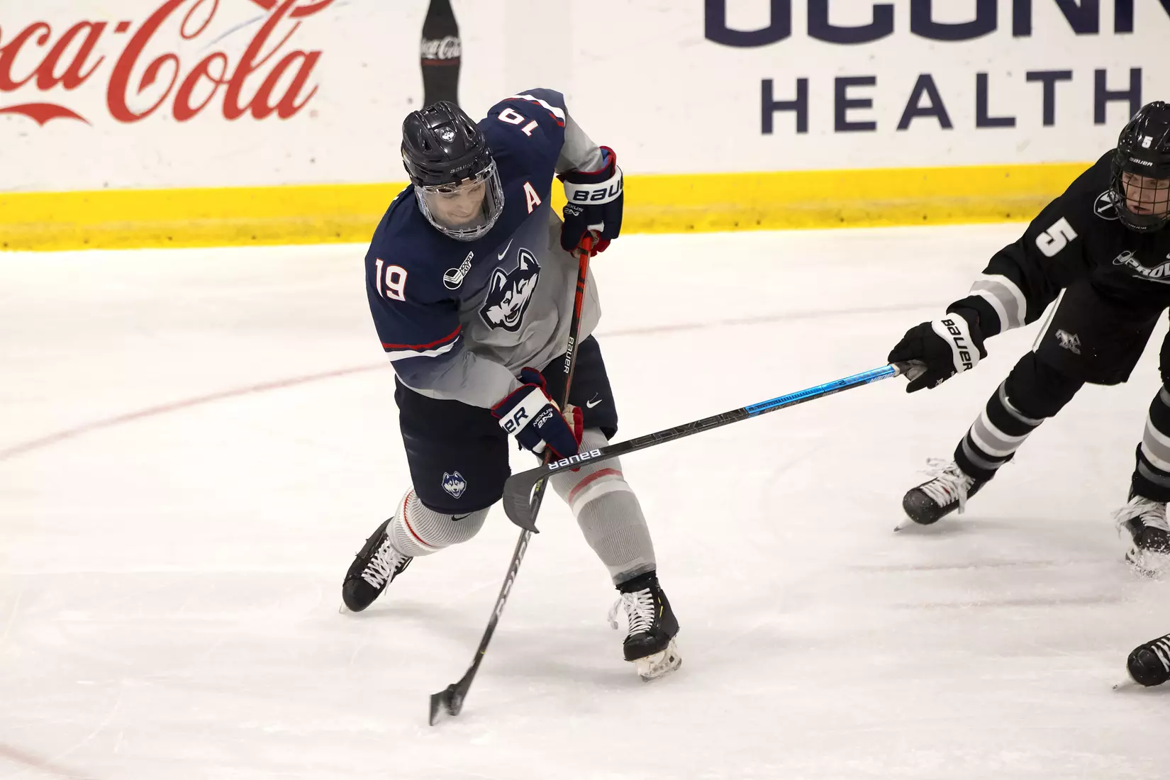 Brian Rigali rips a shot against Providence on December 28, 2020.