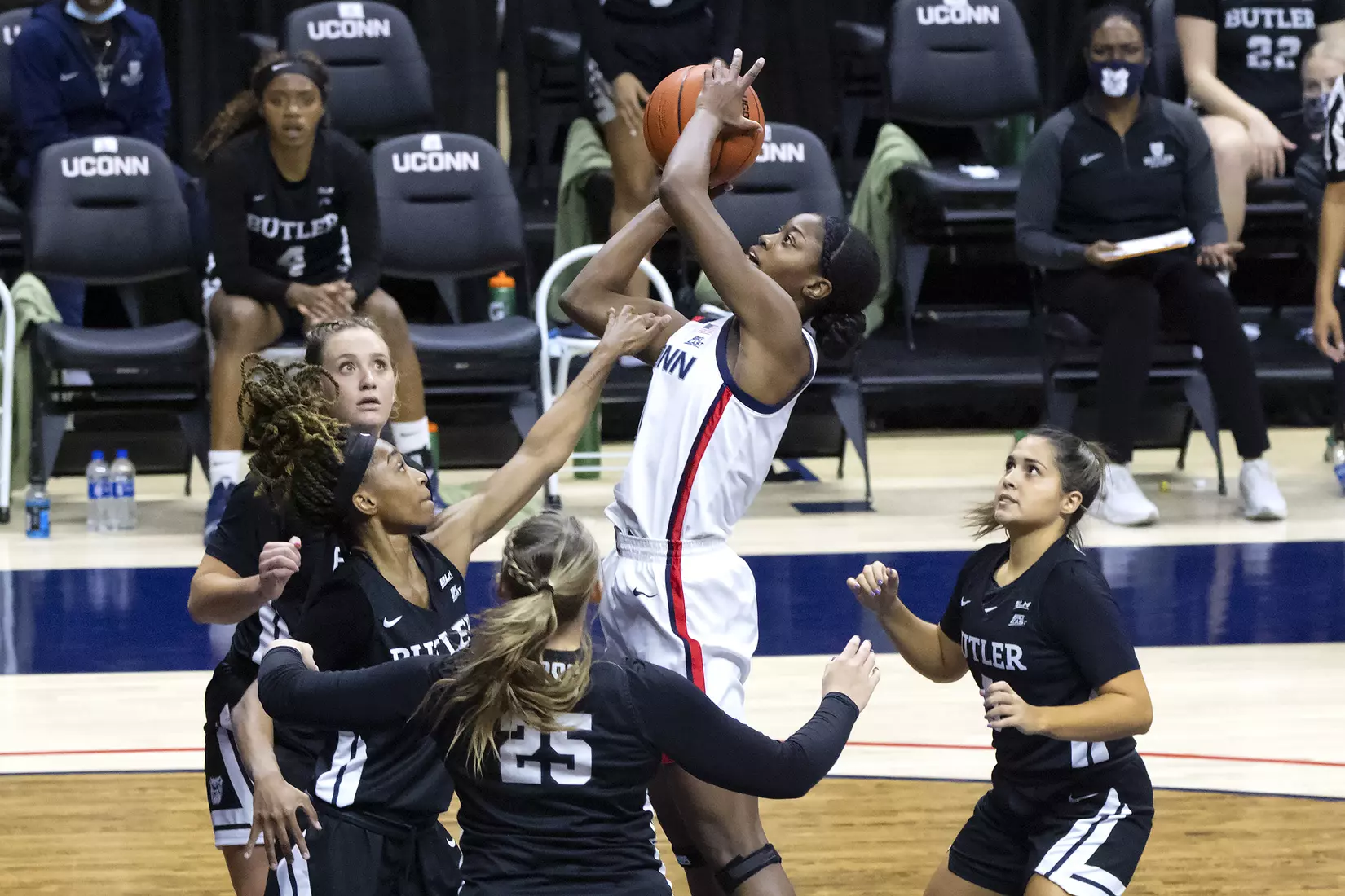 Mir McLean takes a contested shot in the paint against Butler on January 19, 2021.