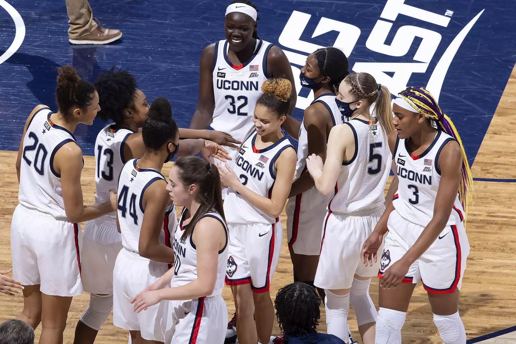 Autumn Chassion is surrounded by teammates after their win over Butler on January 19, 2021.