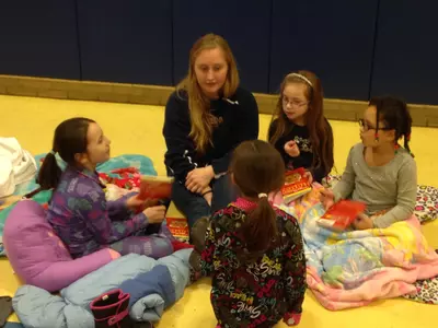 The UConn women's ice hockey team shared lessons with the students.