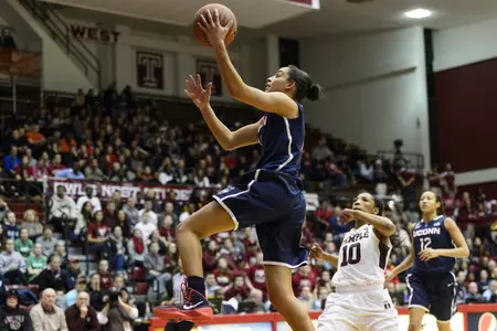 Huskies guard Bria Hartley (14) shoots a layup during the first half.