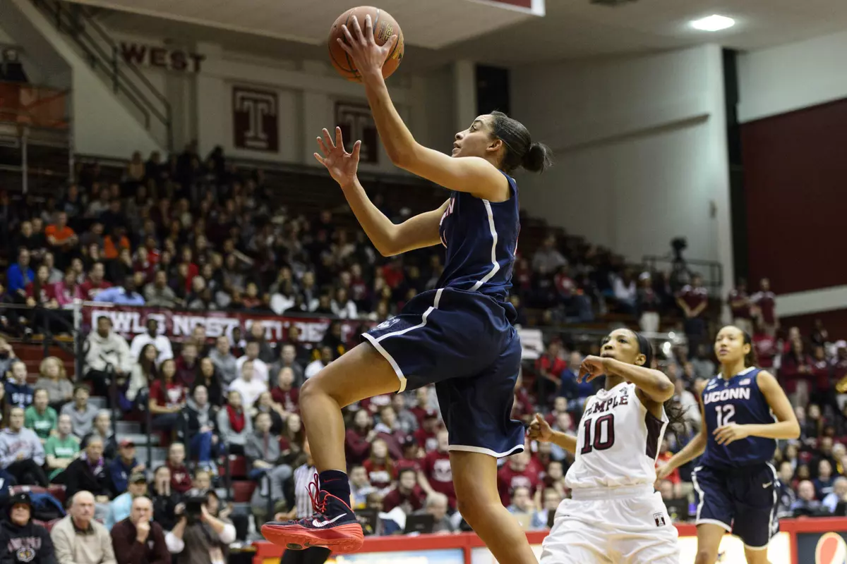 Huskies guard Bria Hartley (14) shoots a layup during the first half.