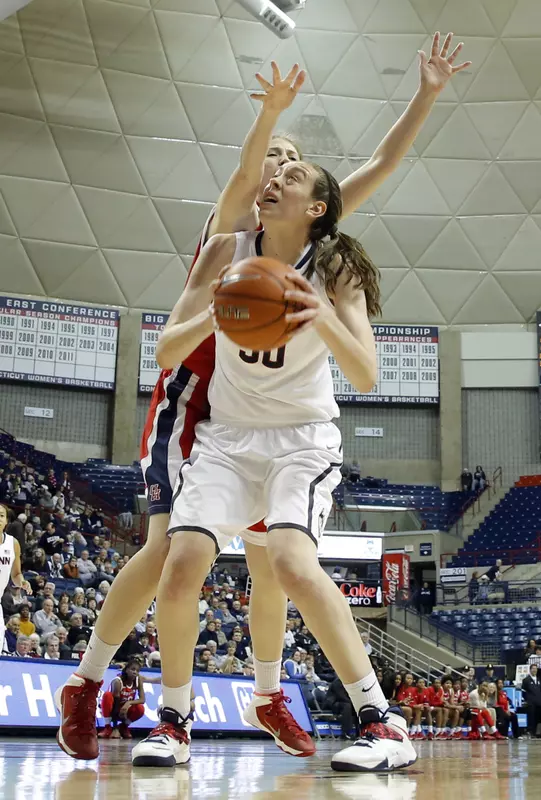 Breanna Stewart (30) shoots against Houston Cougars center Mae Woods (25