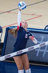 Devon Maugle notched 12 kills in UConn's 3-0 setback on Sunday.