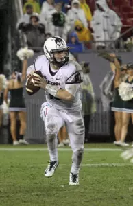 Chandler Whitmer and the Huskies face Temple on Saturday.