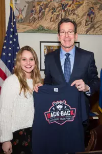 Senior captain Chrissy Davidson posed with Connecticut Governor Dan Malloy on Friday.