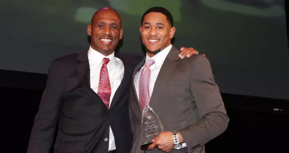 Defensive MVP Andrew Adams and Def. Coordinator Anthony Poindexter