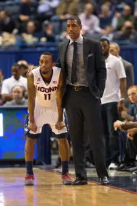 Kevin Ollie, Ryan Boatright and the Huskies face SMU Saturday in Dallas.