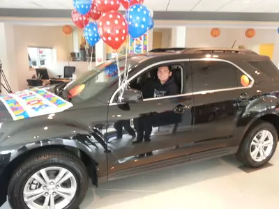 Michael Chave behind the wheel of his new car.