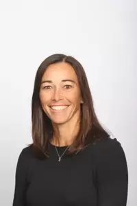 Head coach Jen McIntyre and the Huskies will continue their season on April 8 at Providence.