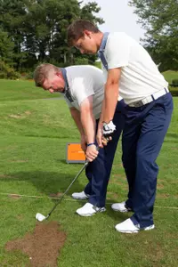 Coach Dave Pezzino, left, and co-captain John Flaherty.