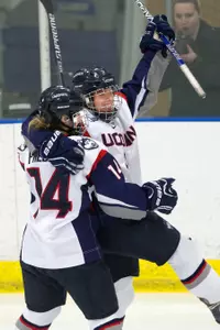 Sophomores Theresa Knutson and Justine Fredette celebrate after one of their combined effort goals.