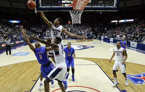 Feb 13, 2016; Storrs, CT, USA; Connecticut Huskies forward Shonn Miller (32) defends against Tulsa Golden Hurricane guard Shaquille Harrison (3). Credit: David Butler II-USA TODAY Sports
