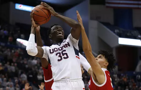 Amida Brimah returned to the court in the Huskies' win at UCF on Sunday