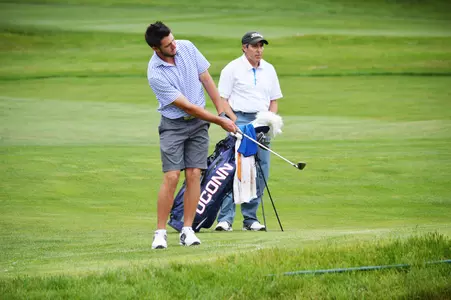 Zach Zaback, with father Andy as his caddy, competes in the Palmer Cup.
