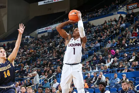 Christian Vital takes a corner three-pointer vs. Merrimack (PC: Steve Slade).