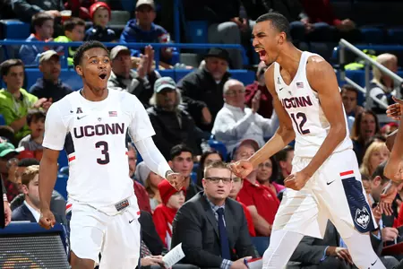 Alterique Gilbert and Tyler Polley celebrate vs. Stony Brook. (PC: Steve Slade)