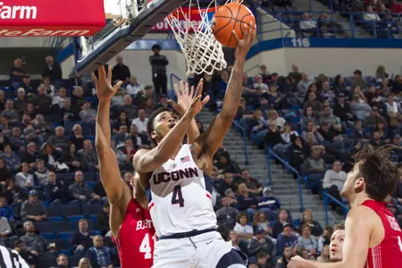 Jalen Adams goes for reverse layup against BU (PC: Steve Slade).