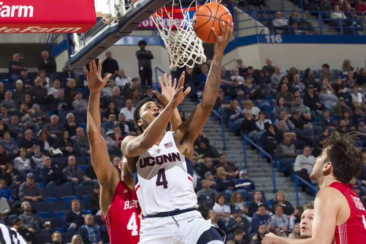 Jalen Adams goes for reverse layup against BU (PC: Steve Slade).