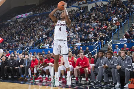 Jalen Adams takes corner three vs. BU (PC: Steve Slade).
