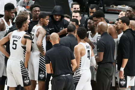 UConn huddle vs. Arkansas on Sunday (PC: RIck Morgan).